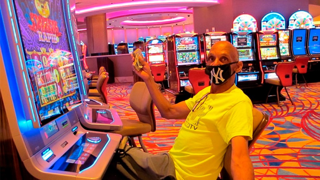 NJ casinos, tracks win $264M in July after virus reopening